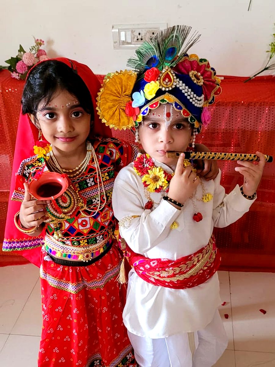 Children dressed as Radha and Krishna for a festival celebration
